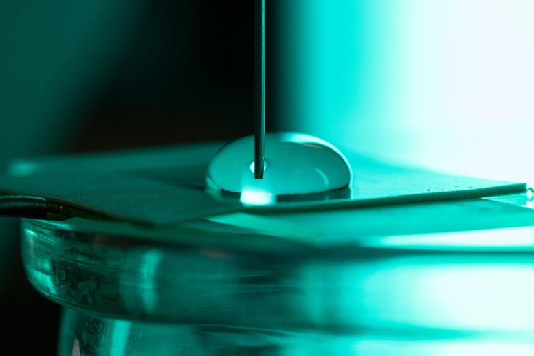 Water Movement on Teflon Surface Electric Charge