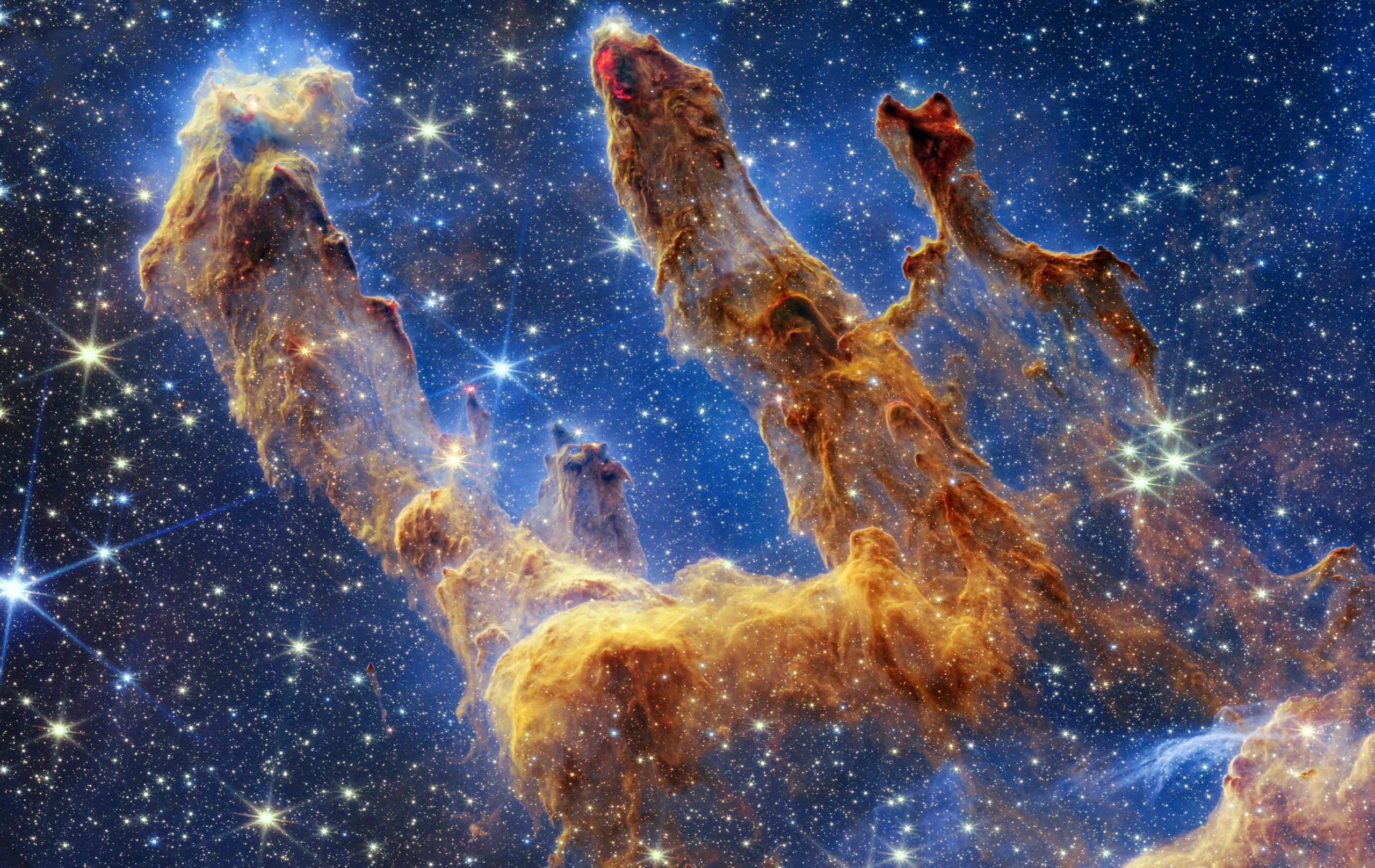 Webb 우주 망원경은 창조의 기둥에 대한 놀라운 별들로 가득 찬 사진을 찍습니다.