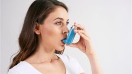 Woman Asthma Inhaler