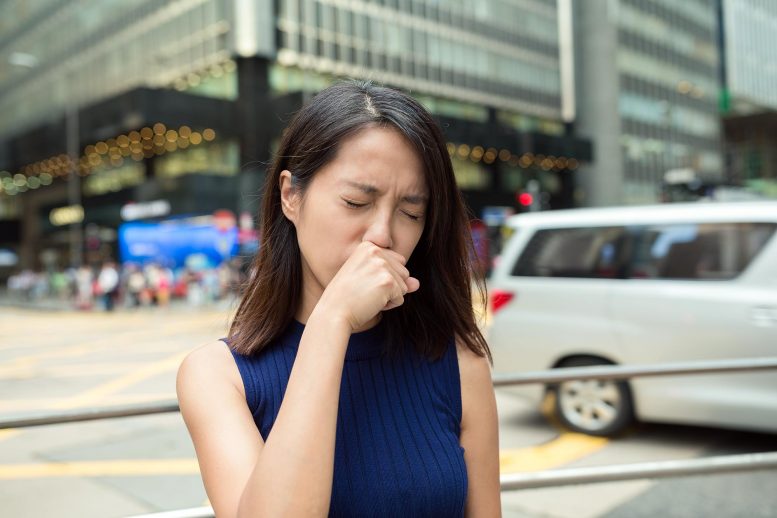 Woman Coughing Outside