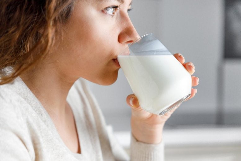Woman Drinking Glass of Milk