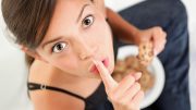 Woman Eating Cookies Sneaking Snacks