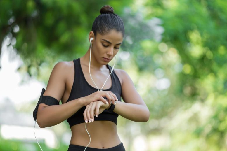 Woman Exercising With Smartwatch