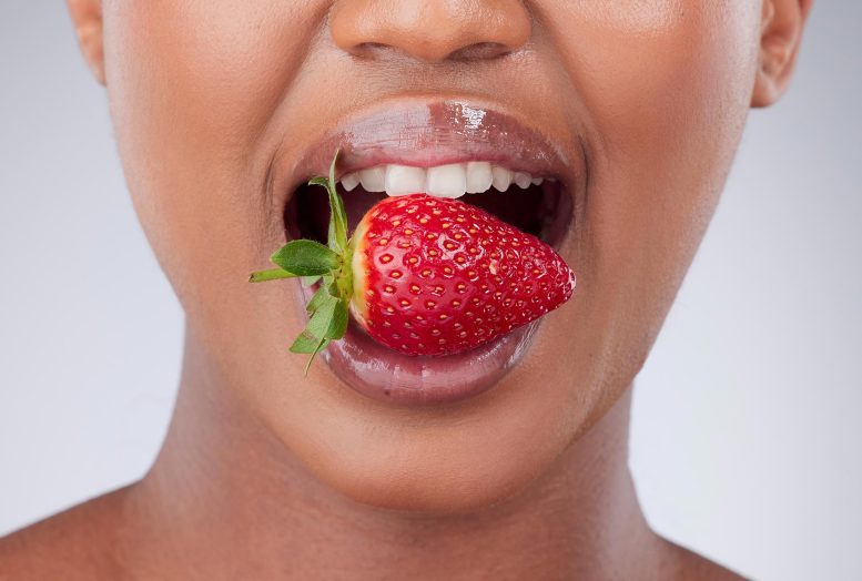 Woman Mouth Eating Strawberry