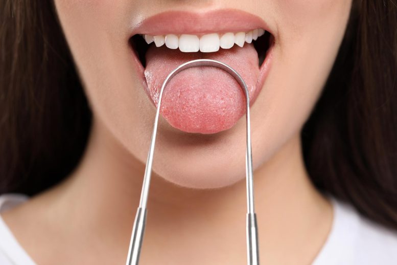 Woman Mouth Toungue Cleaner