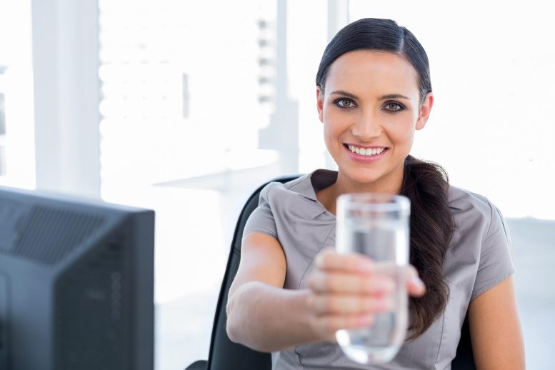 Woman Receptionist Offering Water