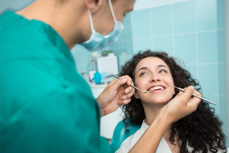 Woman Smiling Dentist Appointment