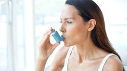 Woman with Asthma Inhaler