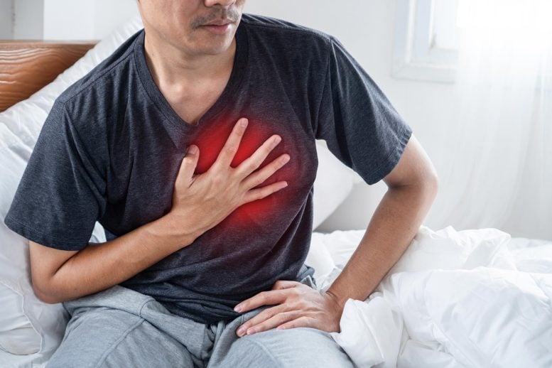 Young Asian Man Sitting Bed Chest Pain Heart Disease Attack