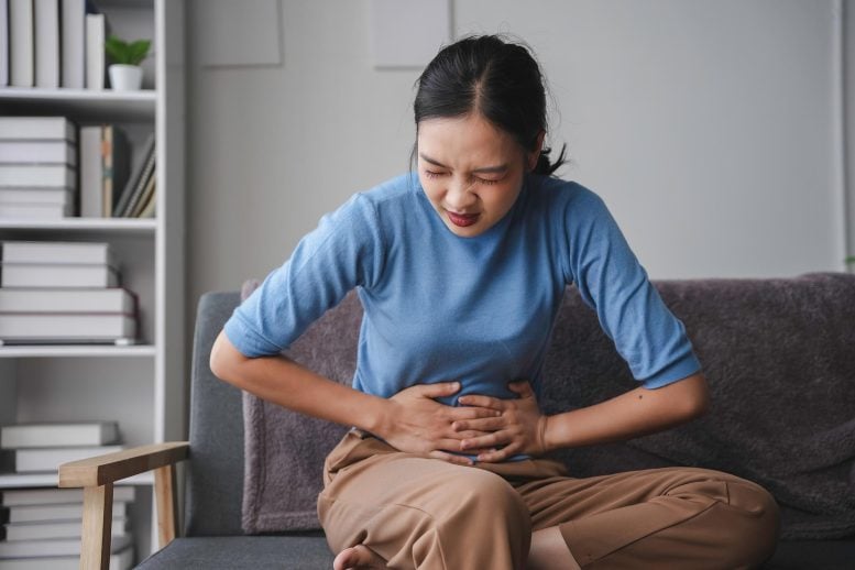Young Asian Woman Stomach Pain IBS