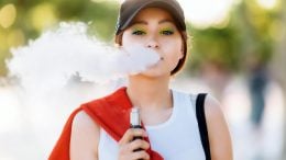 Young Person Vaping E-Cigarette