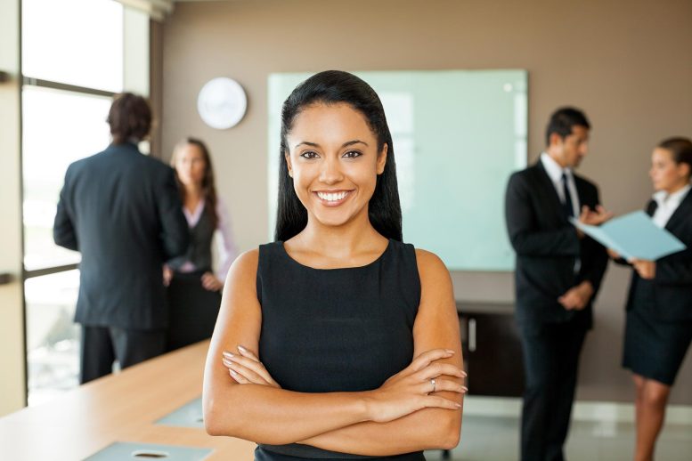 Young Smiling Business Woman Conference Room