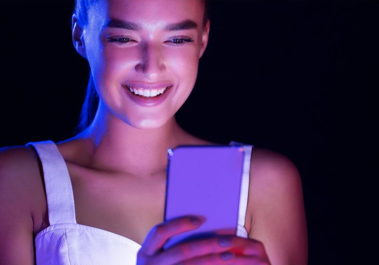 Young Woman Smartphone Glow