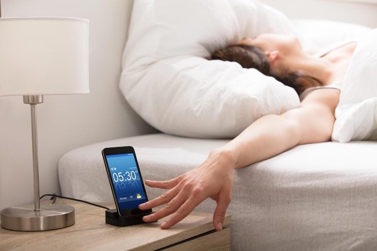 Young Woman Snooze Cell Phone Alarm