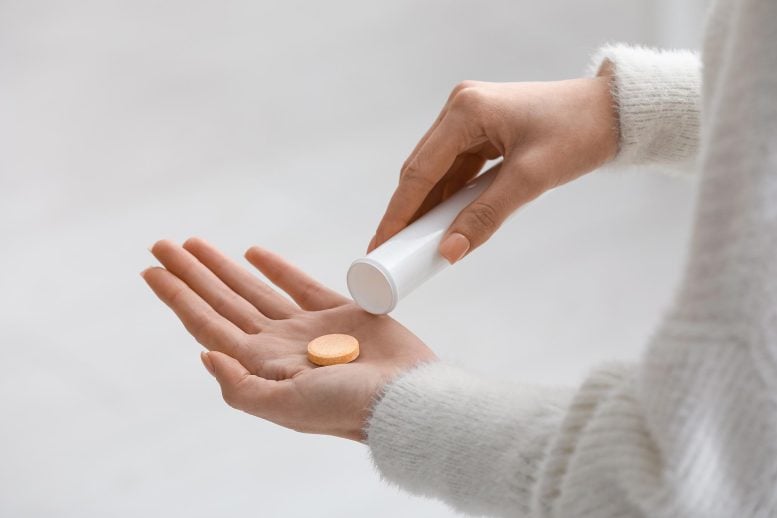 Young Woman Vitamin C Soluble Tablet