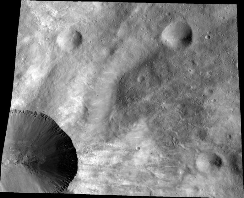 close up of part of the rim around the crater Canuleia on the giant asteroid Vesta