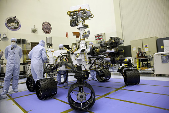 NASA Workers with Curiosity Rover