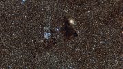The Bright Star Cluster NGC 6520 and Its Neighbor Barnard 86