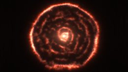unexpected spiral structure in the material around the old star R Sculptoris